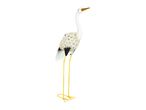 Metal crane statue, white with yellow accents.