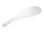 A white rice paddle with a textured surface, angled on a white background.