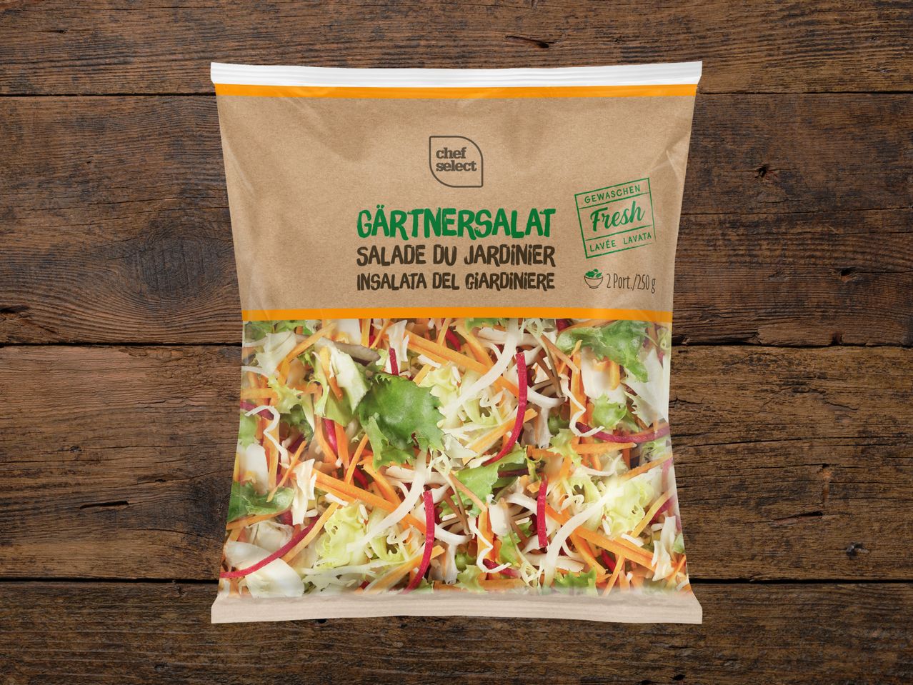 Chef Select Gärtnersalat: 250g gewaschener, frischer Gartensalat in einer Verpackung aus Papier und Plastik.