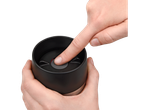Hands pressing the button on a black Tefal® thermal mug.