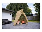 A protective plant cover tent sheltering potted plants on a patio.