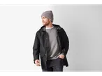 Man in esmara® men's raincoat, grey beanie, and grey sweatshirt