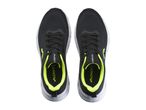 Pair of black and neon yellow athletic shoes with white soles, viewed from above.