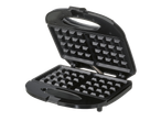 Open black waffle maker, ready to cook.