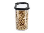 Clear food storage container filled with granola and cashews, with a black lid.