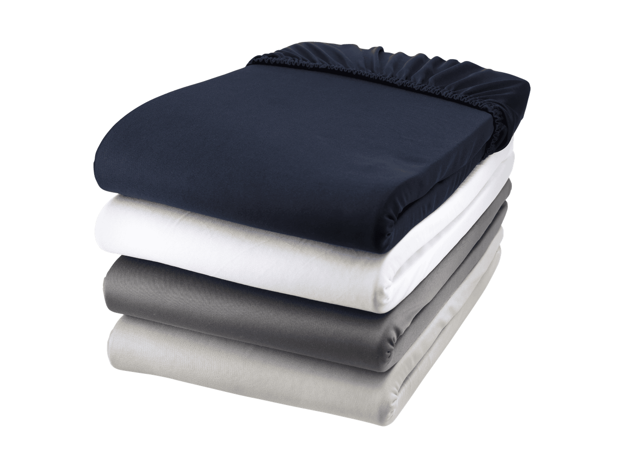 Pile de draps-housses de différentes couleurs : bleu marine, blanc, gris foncé et gris clair.