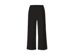 Schwarze, weite Hose.