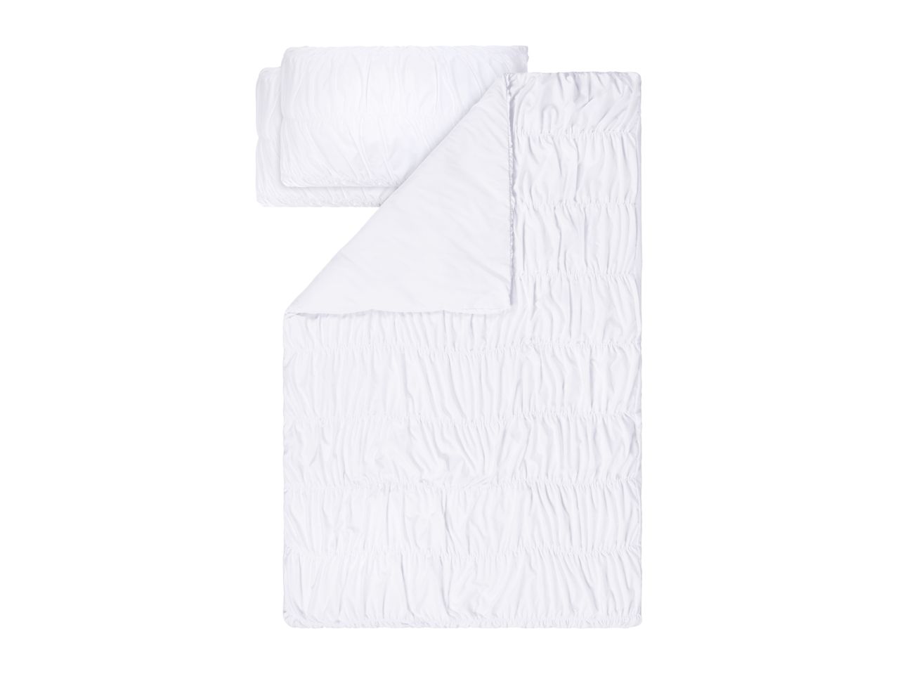 White ruched bedding set with a duvet and pillowcase