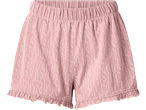 Calções femininos cor-de-rosa com padrão de bolinhas brancas e bainha com folhos.