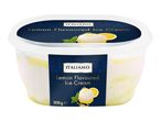 Lemon flavoured ice cream in a white tub with a dark blue label.