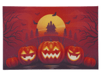 Halloweeni lábtörlő vörös háttérrel, kísértetházzal és vicsorgó tökökkel.
