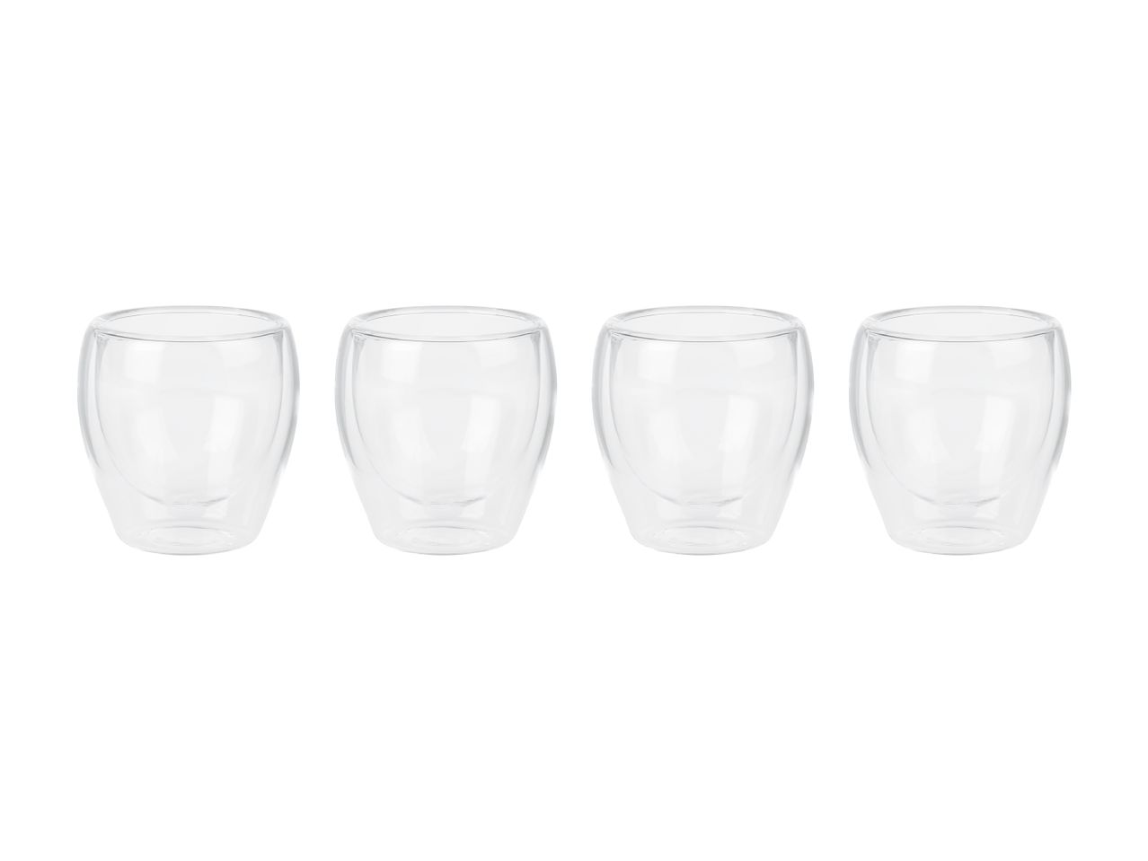 Four clear double-walled glass cups arranged in a row.