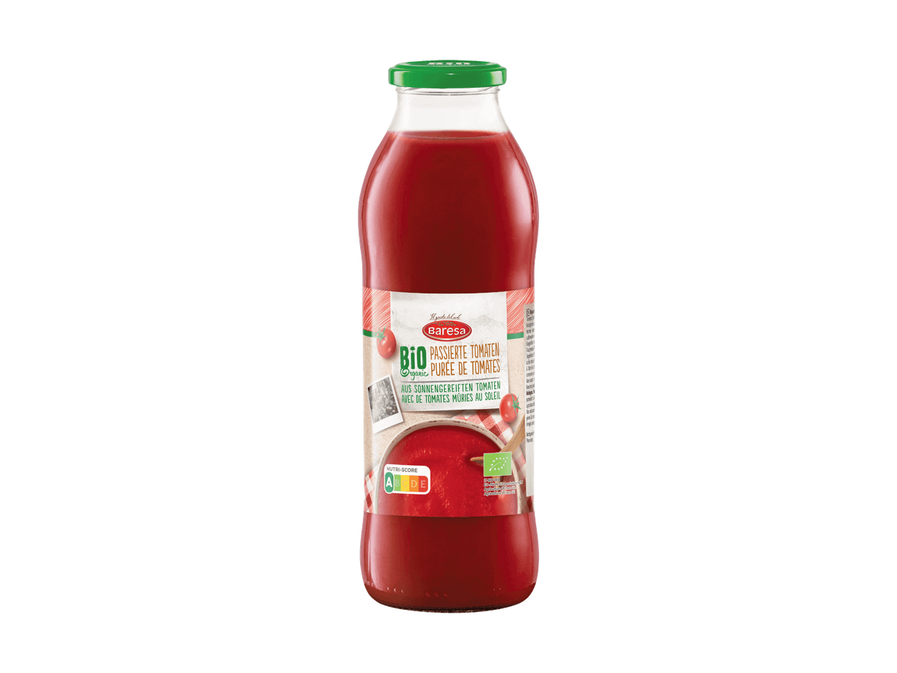 Purée de tomates bio en bouteille en verre avec bouchon vert.