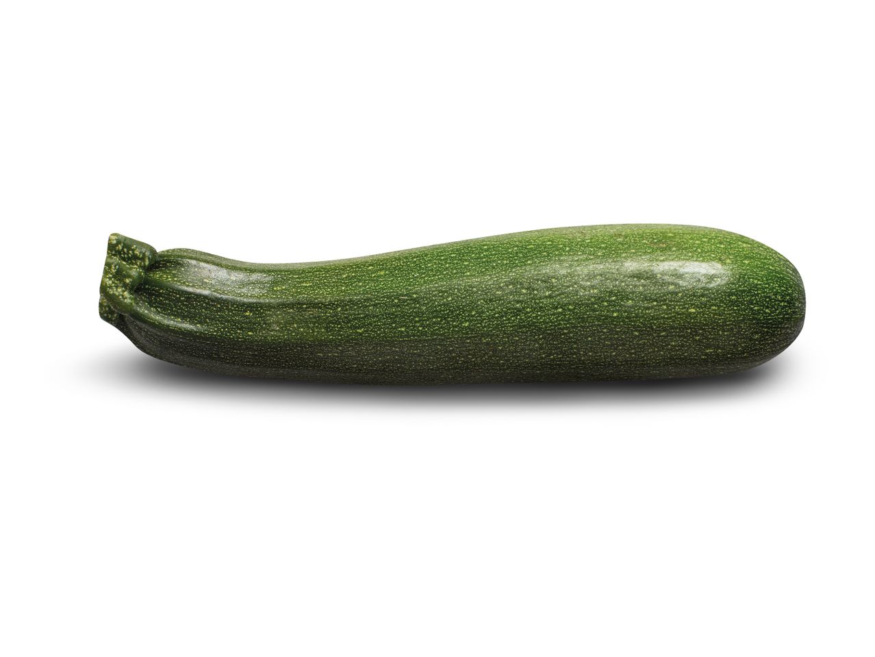 Green zucchini isolated on white background.