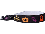 Halloween hair tie with a haunted house, pumpkin, and gravestones