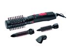 Un set di spazzole ad aria calda Remington nere con accessori intercambiabili e punte rosa.