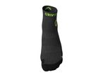 Black sports sock with green accents and textured patterns
