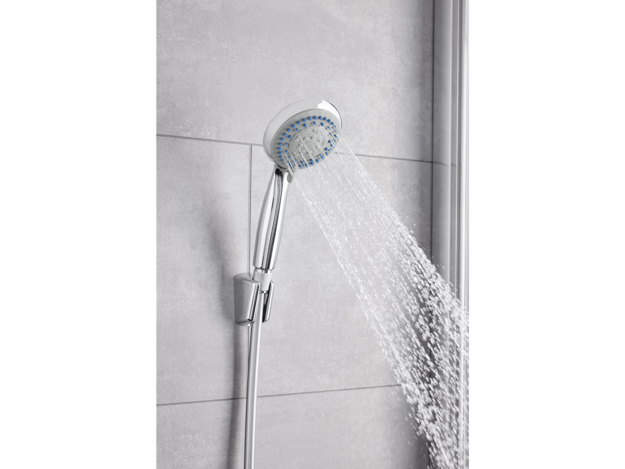 Chrome shower head with water stream.