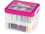 Pink Celando box with thread, needles, and tape measure.