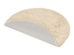 Cream-colored half-round bath mat with a non-slip backing, partially folded to show texture.