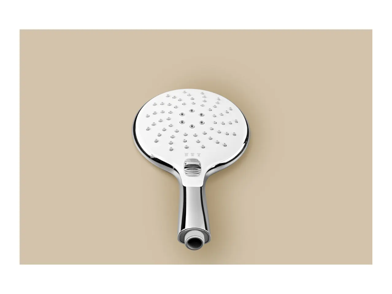 A chrome and white handheld shower head with multiple spray settings on a beige background.