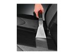 A hand using a wet vacuum cleaner nozzle to clean a car seat upholstery.