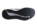 Bottom view of a black and white athletic shoe sole with a textured grip pattern.