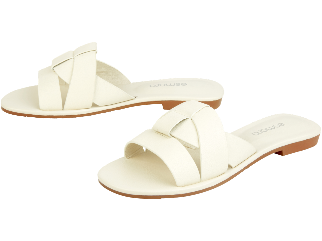 Beli espadrili s prekrižanimi trakovi.