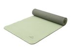 Light green yoga mat, partially rolled up, with a textured surface.