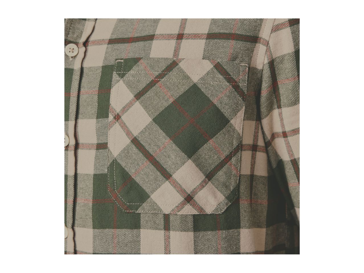 Close-up of a green and beige plaid flannel shirt with a chest pocket.