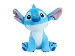 Blue plush toy of a cartoon alien character with large ears and a wide smile