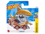 Toy car in shark shape, golden with red wheels, in packaging with blue wave design.