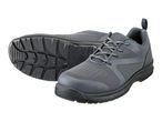 Pair of grey safety shoes with black soles, one showing the tread pattern.