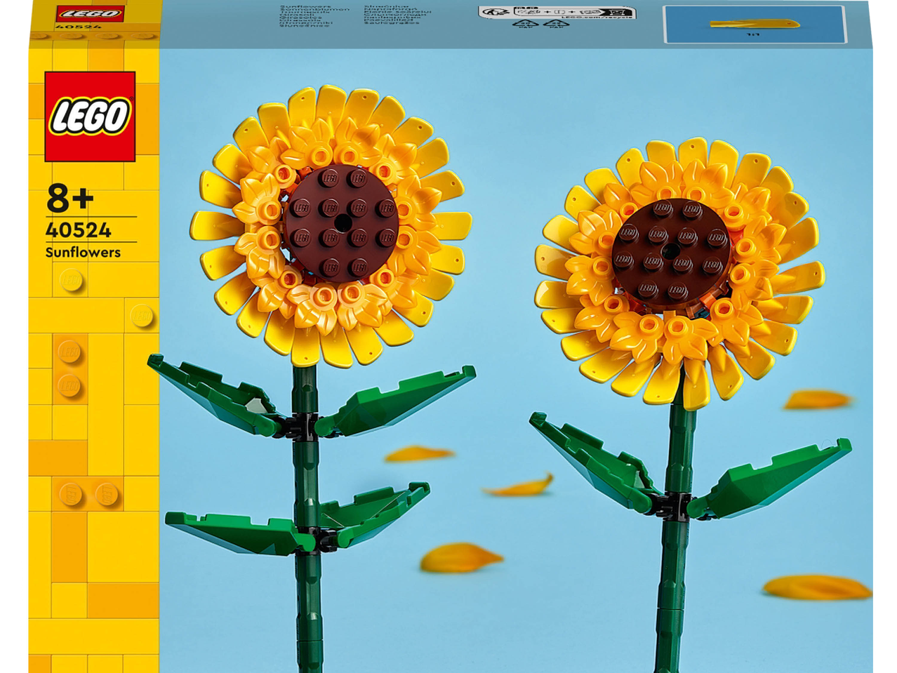 LEGO Sunflowers 40524, un set di due girasoli costruibili su sfondo blu.