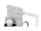 Toy kitchen with marble-effect backsplash, white pot on hob, and rose gold tap.