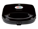 Black sandwich maker with red and green indicator lights and a hot surface warning symbol.