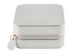 A small, gray, zippered jewelry box.