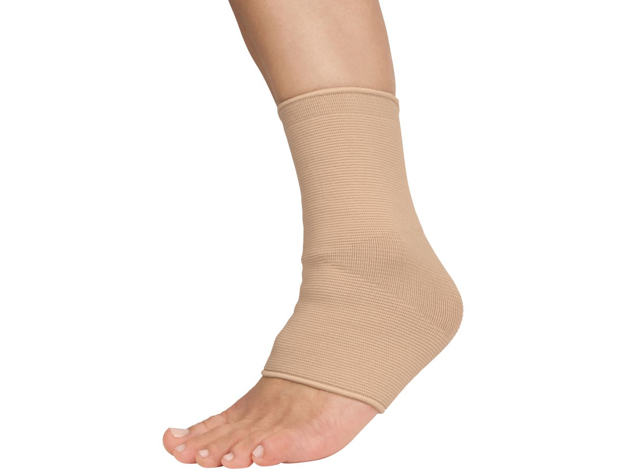 A person's foot and lower leg wearing a beige ankle support brace.