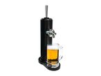 Black beer dispenser with a glass of beer and foam