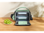 Lancheira Silvercrest® com dois recipientes e elemento de refrigeração, ao lado um prato de uvas verdes.
