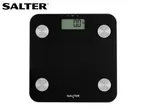 Black digital bathroom scale with a display showing '0.0 kg' and silver accents.
