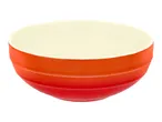 Red and orange ceramic bowl with a cream-colored interior