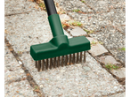 Parkside® Weed Brush Set / Weed Puller cleaning weeds from between paving stones.