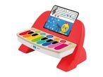 Colorful toy piano with music sheet featuring a cartoon character and stars