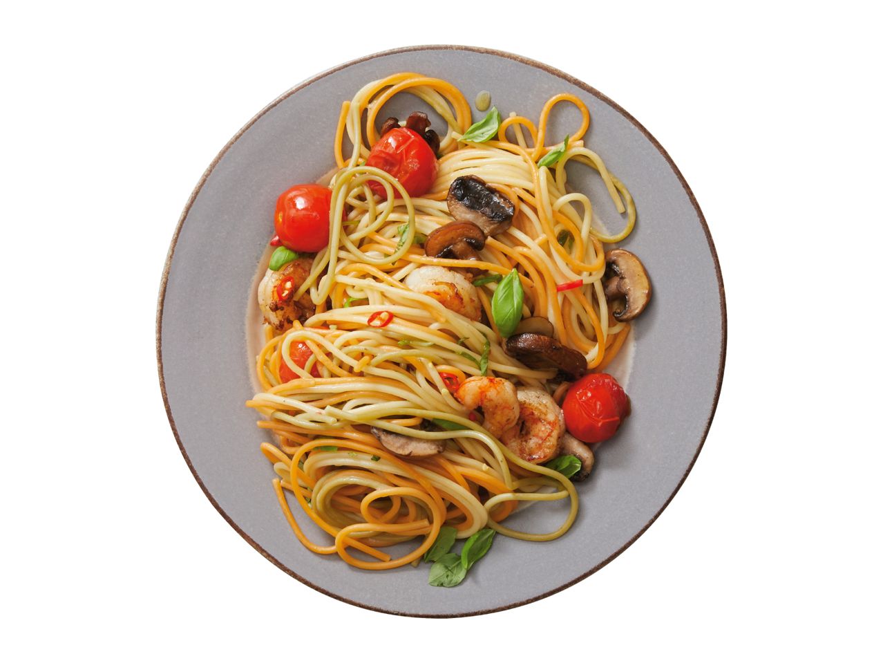 Spaghetti with shrimp, mushrooms, cherry tomatoes, and basil on a grey plate.