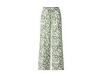 Green and white floral print wide-leg trousers with a drawstring waist.