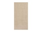 Beige textured rectangular rug.