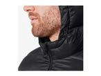 Close-up of a man with a beard wearing a black puffer jacket with a hood.