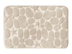 Beige bath mat with embossed pebble, seashell, and starfish patterns.