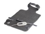 A gray heating pad with straps and a white control unit.